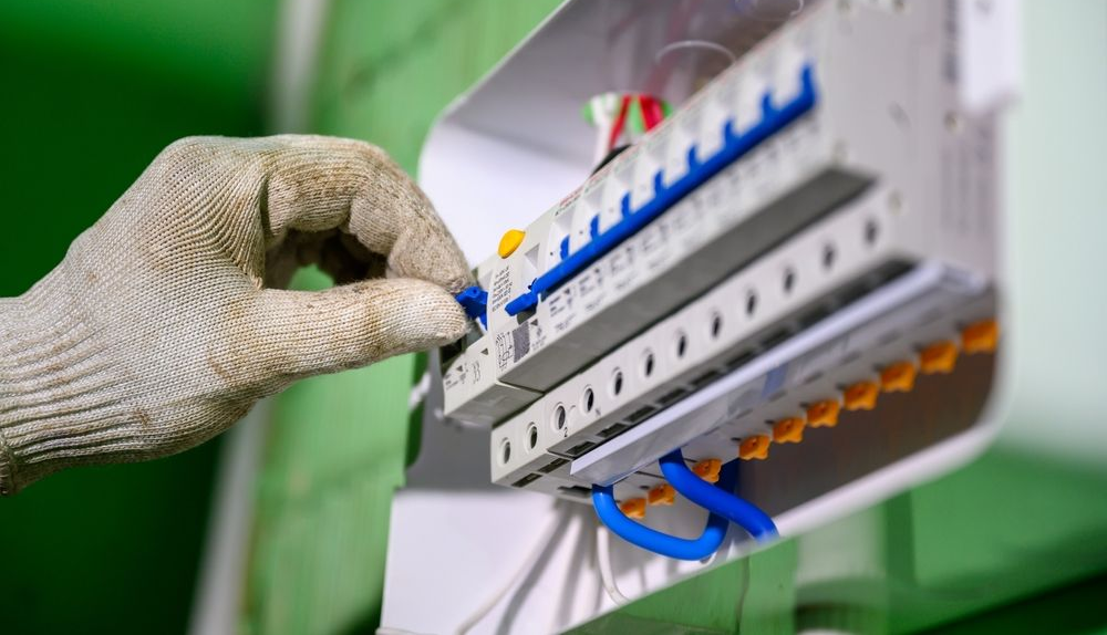 BTM Electrical & Air electrician working on a Gold Coast switchboard upgrade